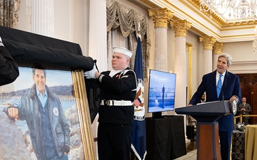 Secretary of State Antony J. Blinken delivers remarks at a portrait unveiling of the 68th Secretary of State John Kerry at the Department of State