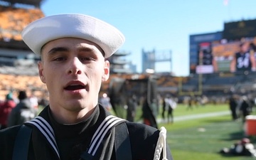 Aviation Boatswain's Mate (Handling) 3rd Class Dalton Demay gives a shout out to the Pittsburgh Steelers.