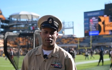 Chief Mass Communication Specialist Benjamin Dobbs gives a shout out to the Pittsburgh Steelers.