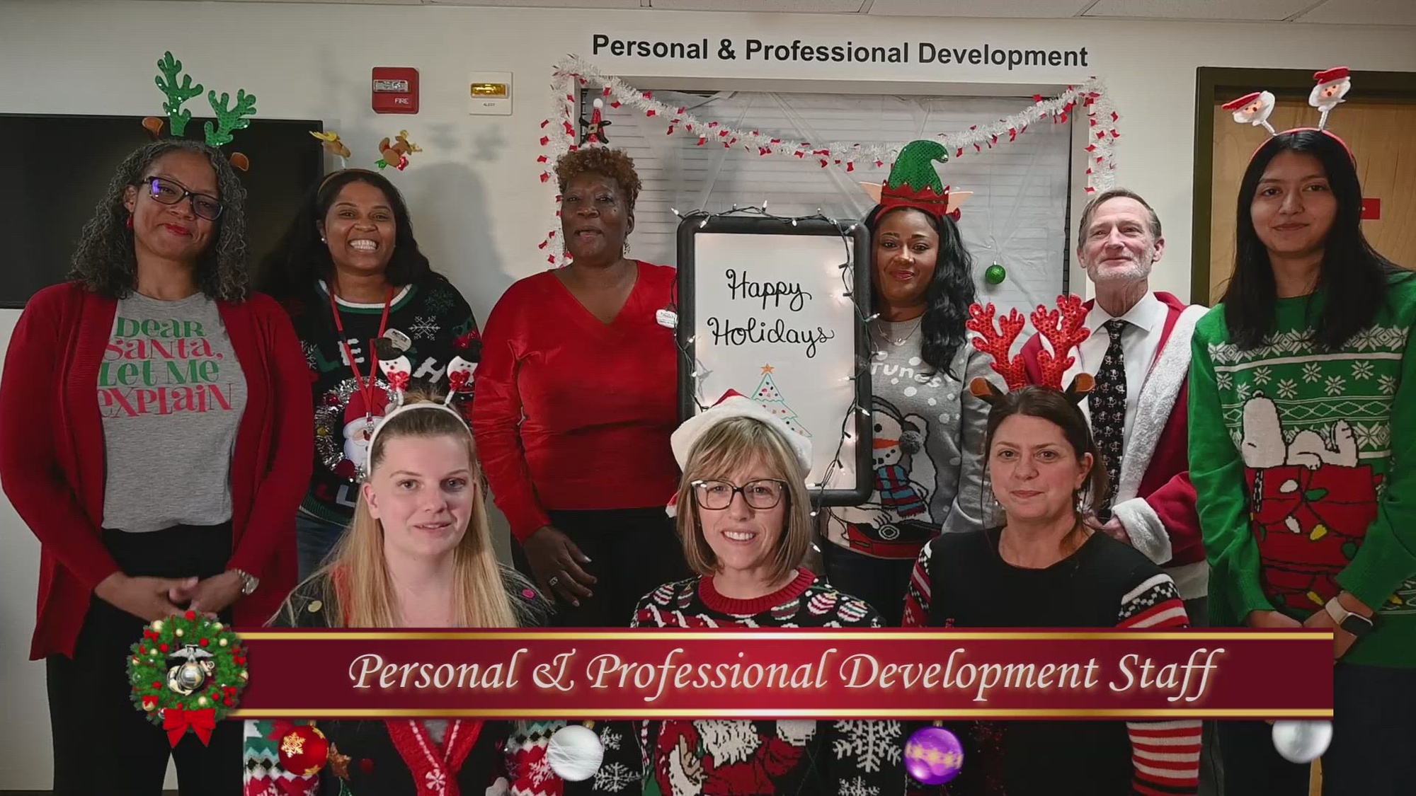 Staff members of the Personal and Professional Development section in the Chapel Annex building deliver a base-wide holiday message on Marine Corps base Quantico, Dec. 6, 2024. The holiday message intends to spread glee across the base during the season of cheer. (U.S. Marine Corps video by Lance Cpl. Catherine Schei) 