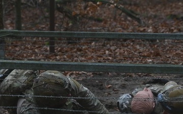 Soldiers compete in Tactical Combat Casualty Care challenges during EBMC