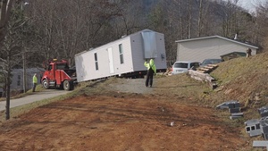 Manufactured Housing Units Transported to Commercial Park for Survivors