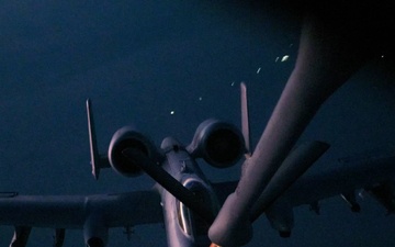 A-10 Thunderbolts conduct aerial refueling over USCENTCOM AOR