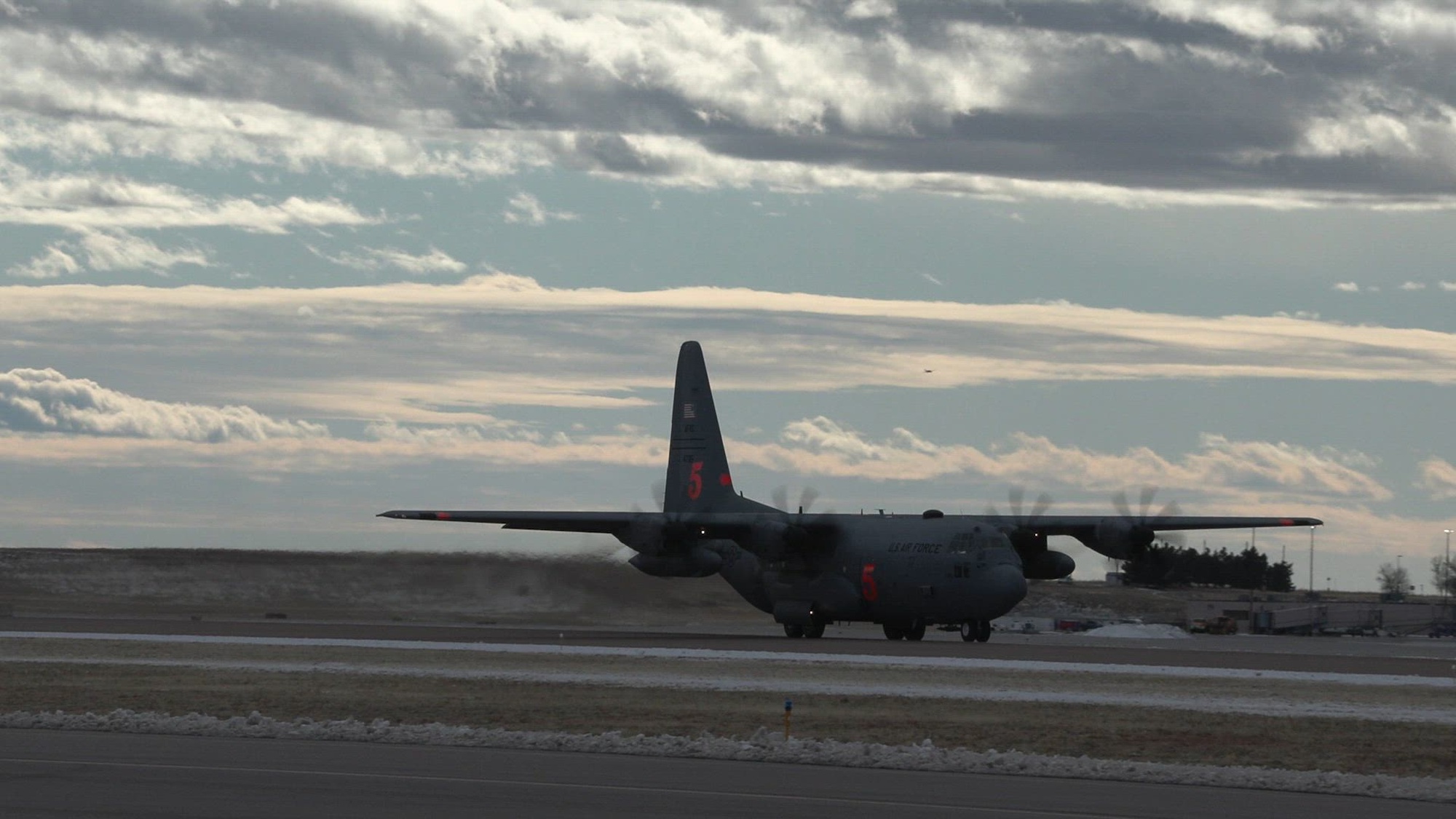 The 302nd Airlift Wing sent a C-130H Hercules aircraft equipped with a Modular Airborne Firefighting System unit to California in support of fire suppression efforts Jan. 11, 2025. The aircraft took off from Peterson Space Force Base and teams can respond to short-notice requests for assistance any time. (U.S. Air Force video by Tech. Sgt. Justin Norton)