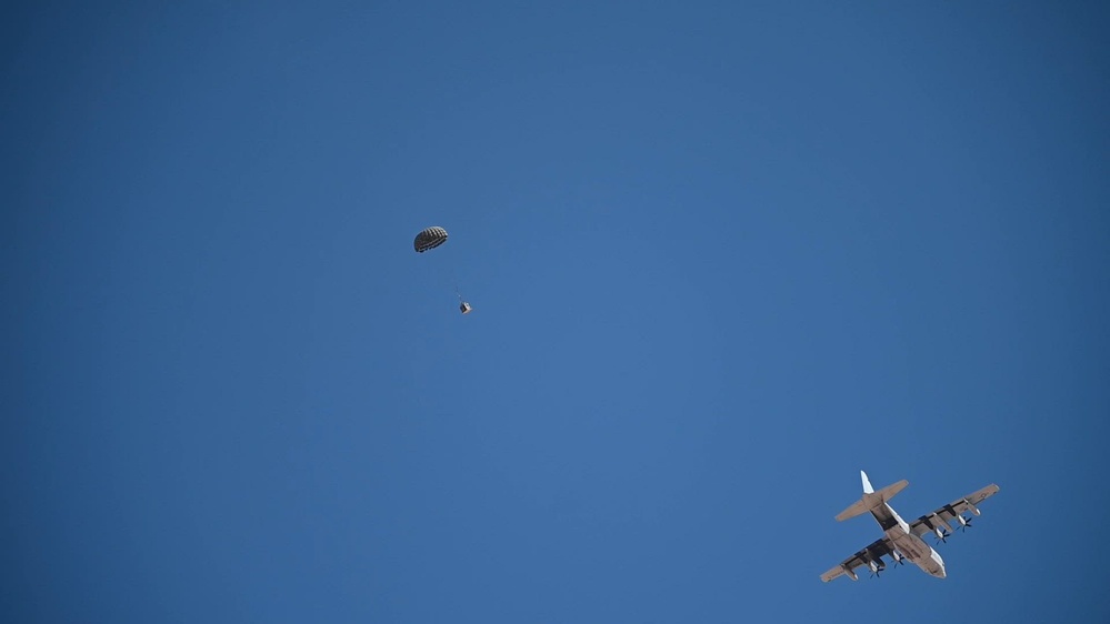 DVIDS - Video - Cargo is released from a U.S. Marine Corps KC-130J Hercules during a training mission and U.S. Air Force 944th FW Airmen recover the airdropped cargo platform for Exercise Desert Hammer 25-1