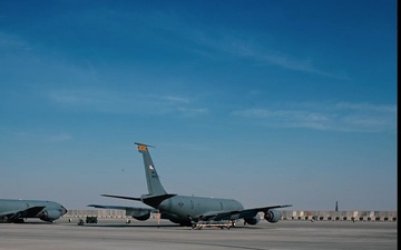 Altitude Adjustment: KC-135 Stratotanker conducts aerial refueling with F-15s and A-10s over USCENTCOM AOR