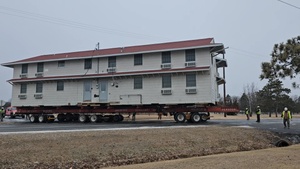 Contractors move first of five World War II-era barracks in 2025, Part 4