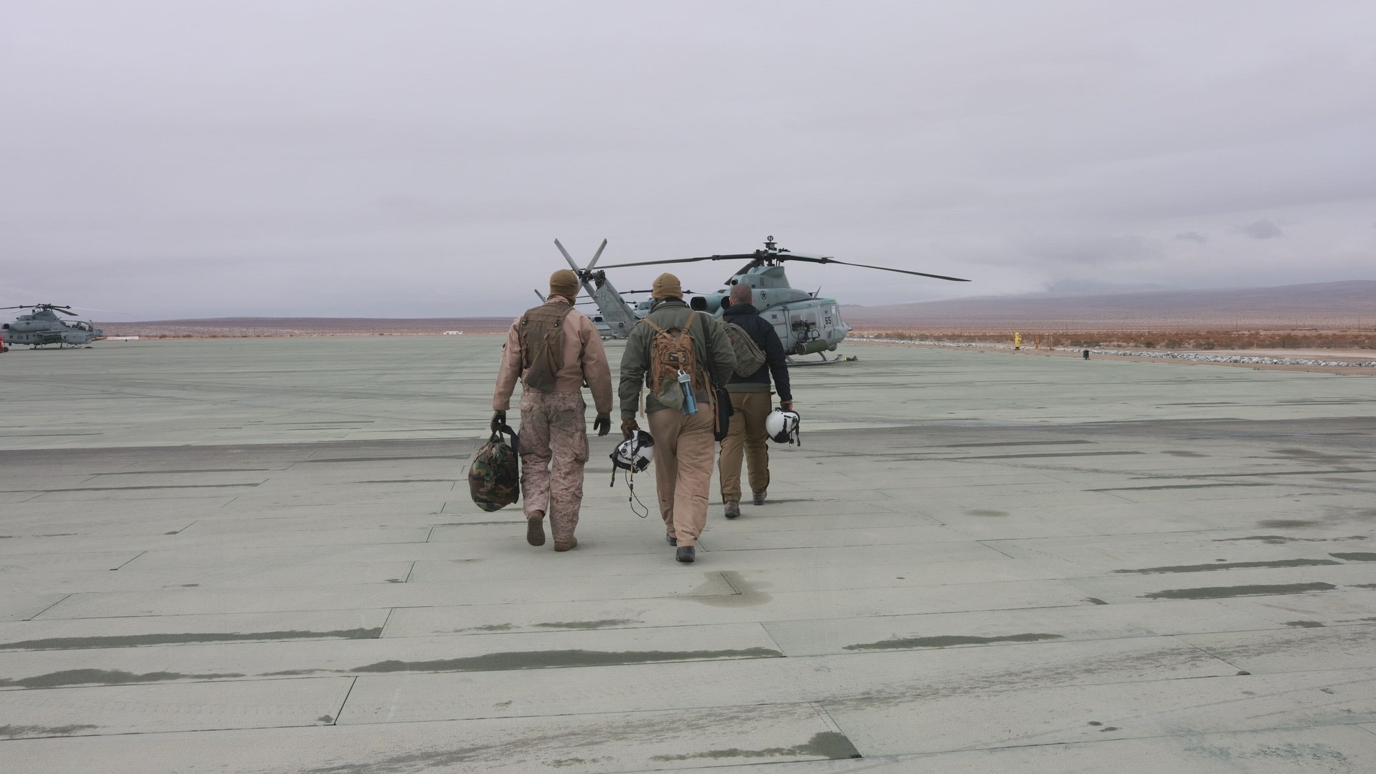U.S. Marines with Marine Light Attack Helicopter Squadron (HMLA) 269 take part in close air support training during an escort flight with Marine Heavy Helicopter squadron (HMH) 461 at Marine Corps Air Ground Combat Center Twentynine Palms, California, Jan. 27, 2025. HMLA-269 and other squadrons assigned to 2nd Marine Aircraft Wing trained to integrate with and support Marine ground units during Service Level Training Event (SLTE) 1-25, a series of training events designed to prepare Marines for operations around the globe. (U.S. Marine Corps video by Cpl. Anakin Smith) <br /><br />This B-roll package contains: Marines being instructed on the GAU-21 .