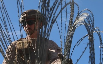 B-Roll: U.S. Marines deploy concertina wire to assist with border security mission