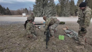 Soldiers from 41st FAB conduct medical assessments on simulated casualties during the brigade evaluation exercise