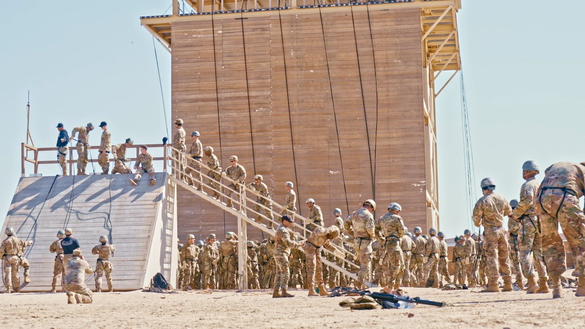 Air Assault candidates rappel off towers on Camp Buehring, Kuwait, February 18, 2025. After completion from the towers, candidates will rappel out of rotary wing aircraft. (U.S. Army video by Staff Sgt. Vincent Levelev)
