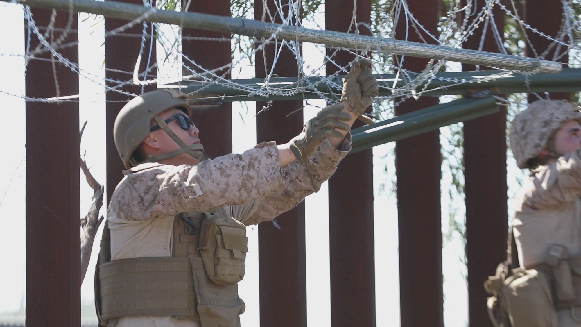 U.S. Marines, with 1st Combat Engineer Battalion, 1st Marine Division, deploy concertina wire along the southern border near San Ysidro, California, Feb. 19, 2025. U.S. Northern Command is working together with the Department of Homeland Security with the emplacement of physical barriers to add additional security that will curtail illegal border crossings. (U.S. Marine Corps video by Lance Cpl. Diego Berumen)