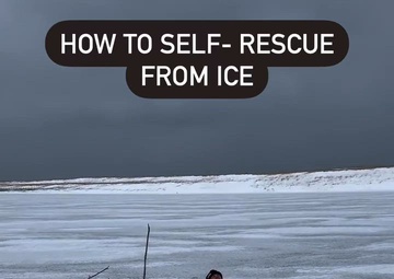 U.S. Coast Guard Station Manistee personnel demonstrate how to self-rescue from ice