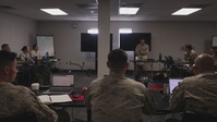 Marines are given an introduction brief during AXLOC