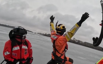 U.S. Coast Guard Station Manistee and Air Station Traverse City conduct cooperative ice rescue training Lake Michigan