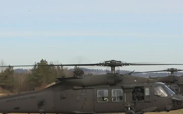 12th Combat Aviation Brigade Soldiers conduct aerial gunnery training in UH-60 Black Hawks