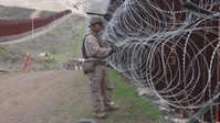 B-Roll: U.S. Marines mount concertina wire along southern border barrier