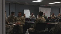 Marines are given an introduction brief during AXLOC