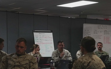 Marines are given an introduction brief during AXLOC