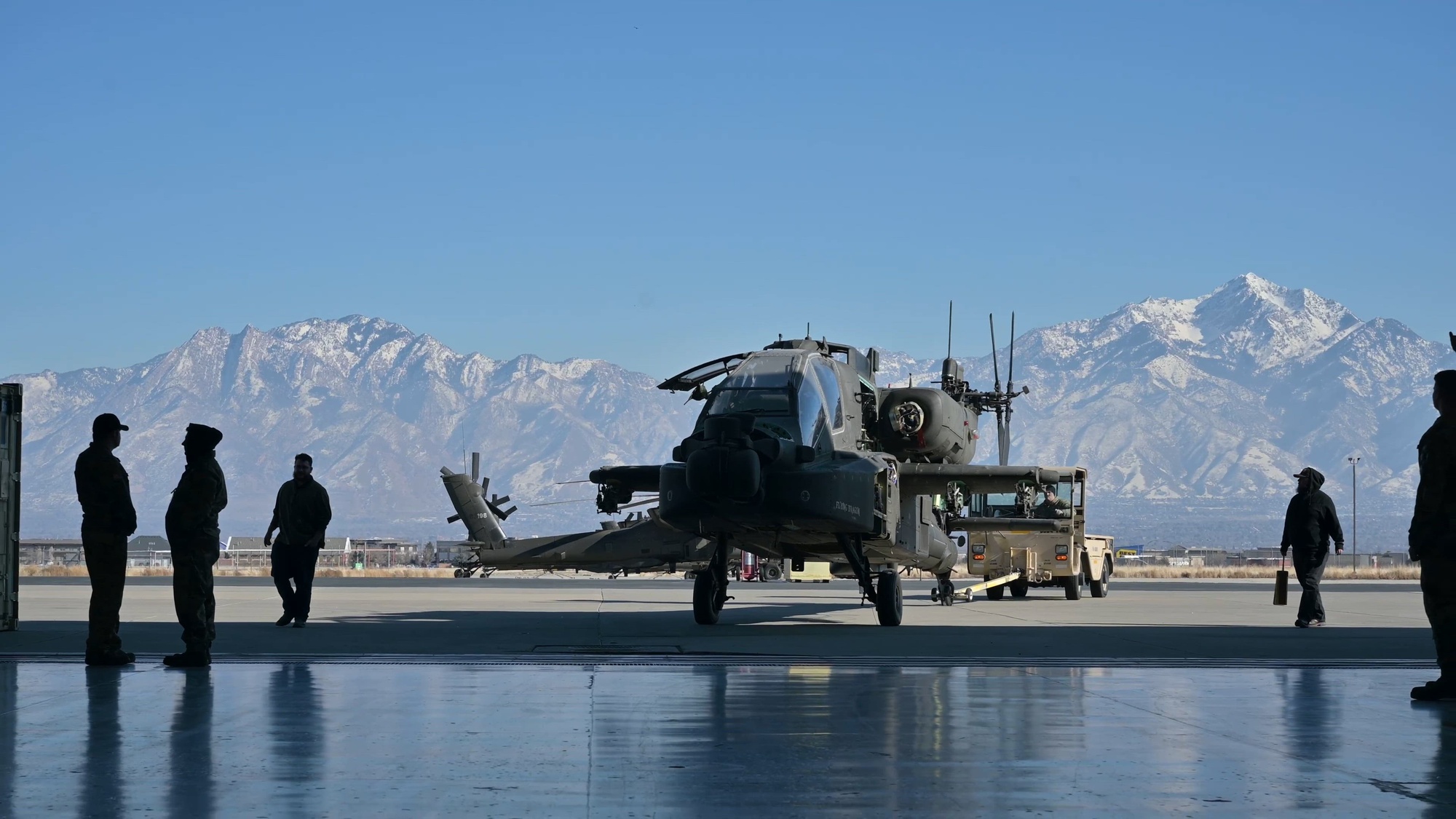 B-Roll- Crew Chiefs and maintainers conduct required maintenance on Ah-64 Apache Attack Helicopters in West Jordan, Utah, Feb. 6, 2025. Members of the Utah Army National Guard 1st Battalion, 211th Aviation Regiment conduct regular maintenance to keep aircraft mission ready. (Utah Army National Guard video by Robert Harnden)