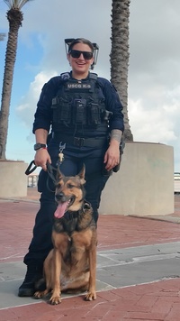 US Coast Guard ME1 Alaina Whitaker and K-9 Ultra Super Bowl LIX Support