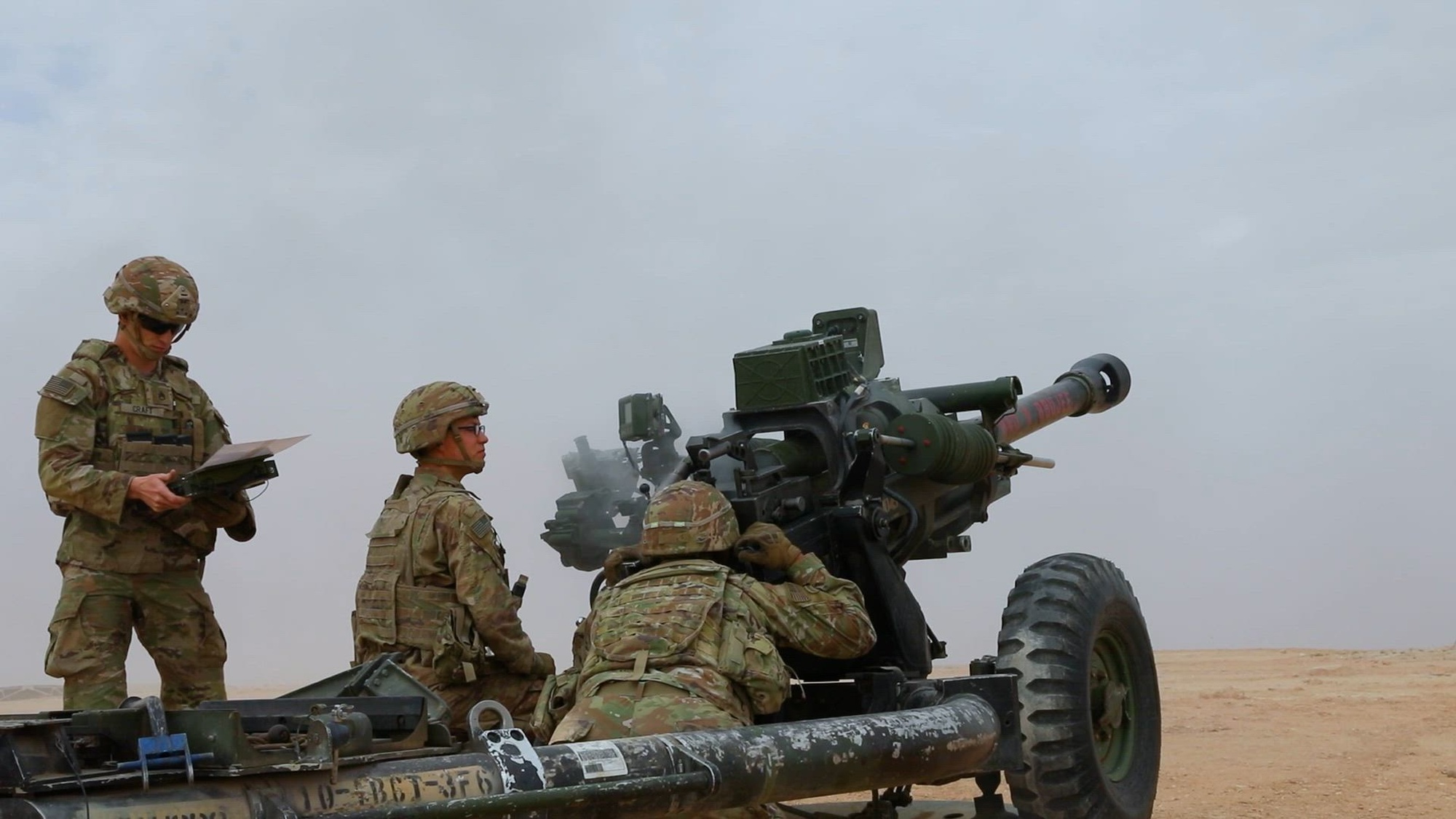 U.S. Army Soldiers, assigned to the 1st Brigade Combat Team, 10th Mountain Division, Task Force Redleg, fire an M119A3 Howitzer during a live-fire exercise at Al Asad Air Base, Iraq, March 7, 2025. The exercise enhances precision artillery skills to maintain readiness in support of Coalition operations. The Coalition is dedicated to advising, assisting, and enabling partner forces to defeat ISIS and maintain regional security and stability. (U.S. Army video by Sgt. Steve Asfall)