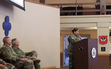 Fort McCoy Garrison Commander provides speech during repatching ceremony at Fort McCoy