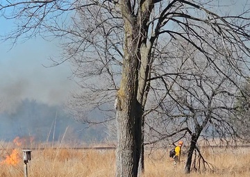 Fort McCoy prescribed burn team coordinates March 2025 prescribed burn on installation