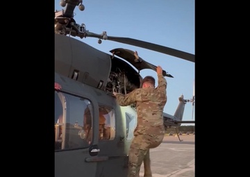 Warrant Officer Flight School Student Preflights Helicopter