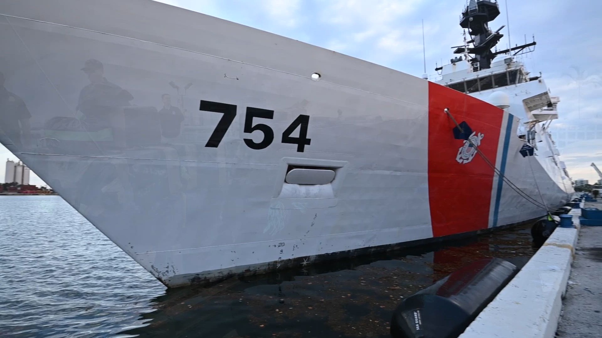 The crew of U.S. Coast Guard Cutter James offloading more than 44,550 pounds of cocaine and 3,880 pounds of marijuana valued at approximately $509.9 million at Port Everglades, on April 9, 2025. This offload was the result of 11 interdictions in the international waters of the eastern Pacific. (U.S. Coast Guard video by Petty Officer 3rd Class Nicholas Strasburg)