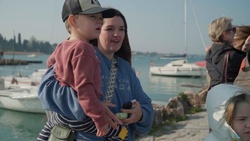 B-Roll: Families watch 173rd IBCT (A) paratroopers leap into Lake Garda during airborne water operation