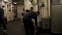 Sailors Onboard USS Iwo Jima Participate in a Main Space Fire Drill