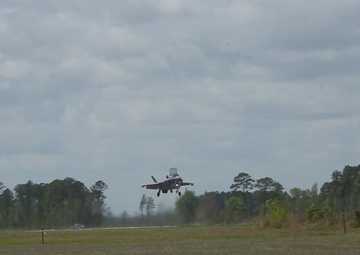 Joint Strike Fighter and KC-130J at Marine Corps Outlying Landing Field Camp Davis South