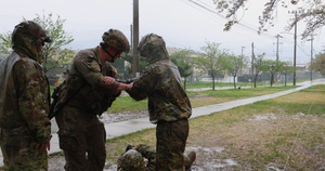 Soldiers Conduct Evacuation Lanes During Expert Field Medical Badge Testing on Camp Casey