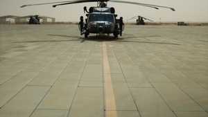 Air Force Jolly Green IIs refuel over USCENTCOM AOR