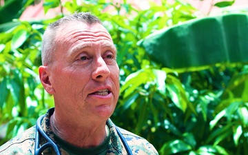 U.S. Navy Cmdr. Darrin Bright speaks about medical civic action program during African Lion 25