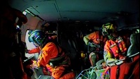 Coast Guard rescues four workers from collapsed water tower