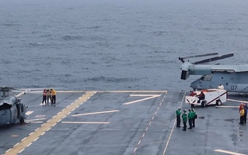 USS Iwo Jima and HSC-26 Conduct Vertical Replenishment Training