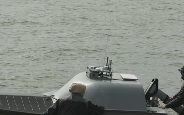 Joint Force USV Resupply Operations During Arcane Thunder 25