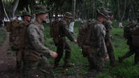 U.S. Marines and Guatemalan Paratroopers conduct jungle survival tactics