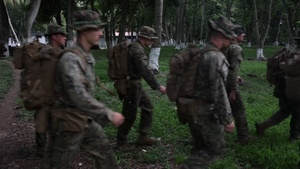 U.S. Marines and Guatemalan Paratroopers conduct jungle survival tactics