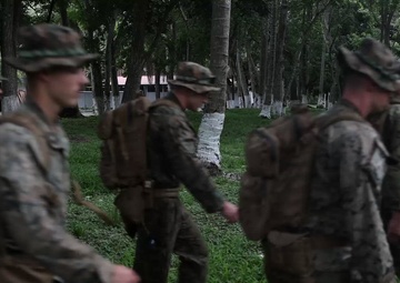 U.S. Marines and Guatemalan Paratroopers conduct jungle survival tactics
