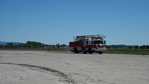 Fairchild AFB firefighters respond to a simulated emergency