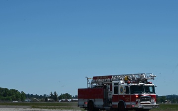 Fairchild AFB firefighters respond to a simulated emergency