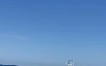 U.S. Coast Guard Station Canaveral boat crew members assist disabled vessel
