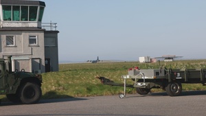 U.S. Marines land in Hebrides, Scotland, offload the AN/TPS-80 Ground/Air Task Oriented Radar