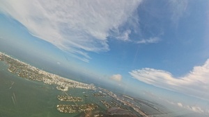 F-22 Raptor full-length demonstration at Miami Beach with flares