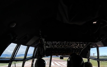 C-130H Air Force Reserve crew flies over Colorado Rocky Mountains