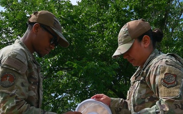 Entomology crew hangs mosquito traps