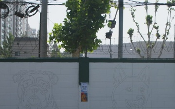 MARFORK Volunteers Join Children In Mural Painting